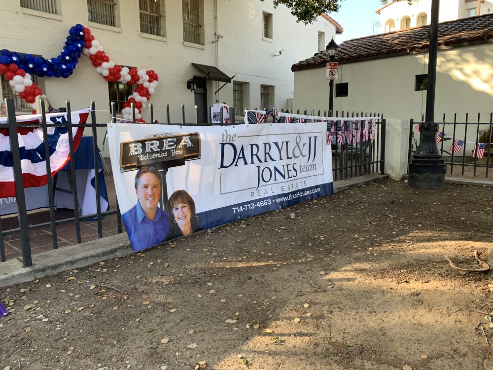 Darryl and JJ poster at Brea's Country Fair on July 4, 2025.